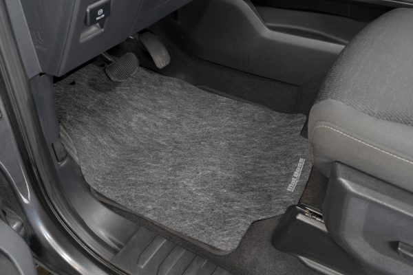 The Car Adhesive Floor Mat applied to the drivers side floor. Brand new, clean, and freshly adhered to the floor.