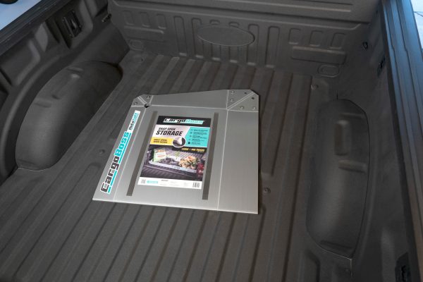 The Snap Open Storage in the bed of a truck folded up for easy compact storage.